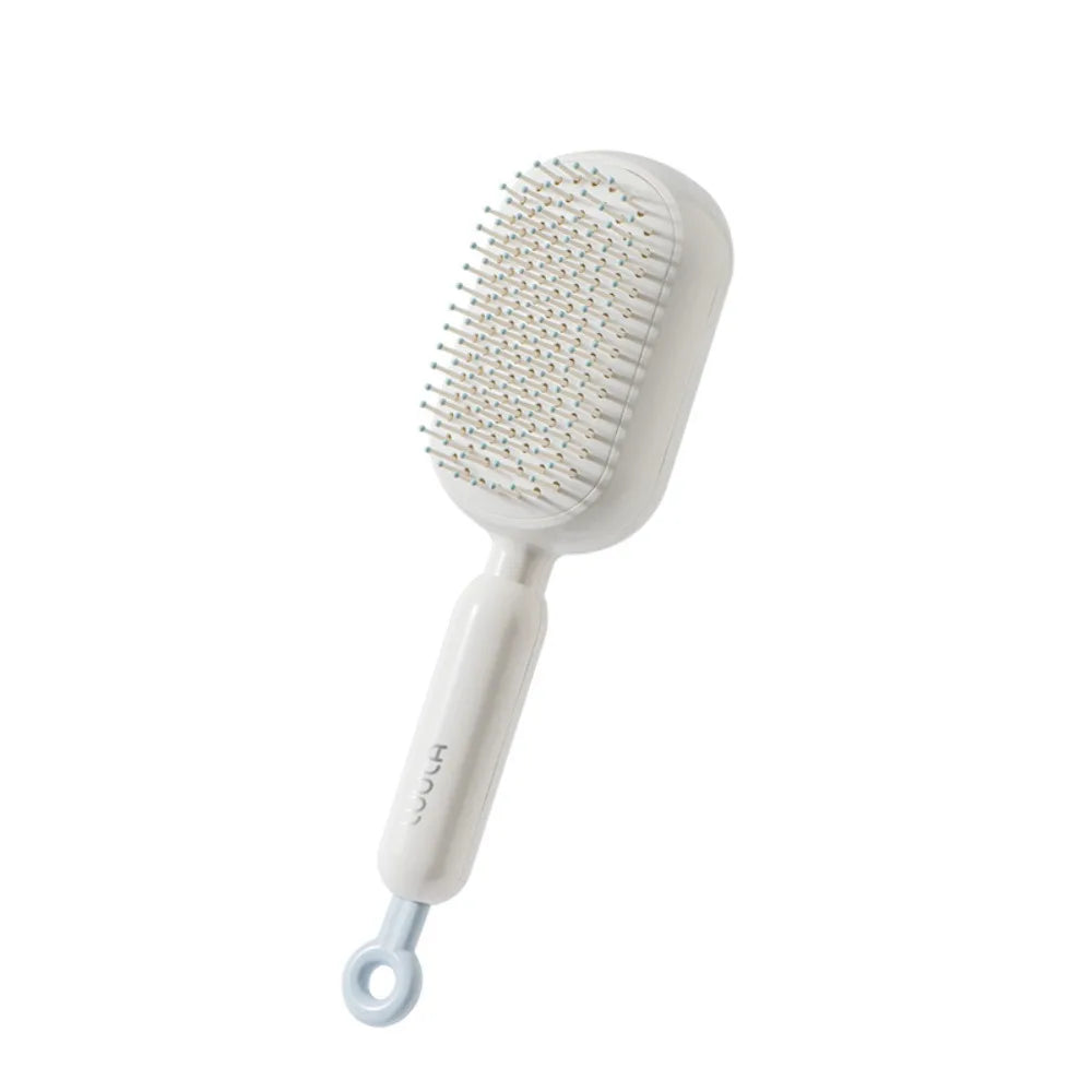 Brosse massage à coussin d’air – Démêlage doux & cuir chevelu stimulé
