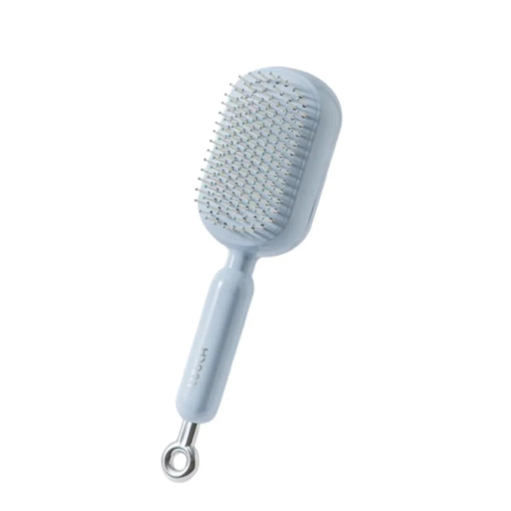 Brosse massage à coussin d’air – Démêlage doux & cuir chevelu stimulé