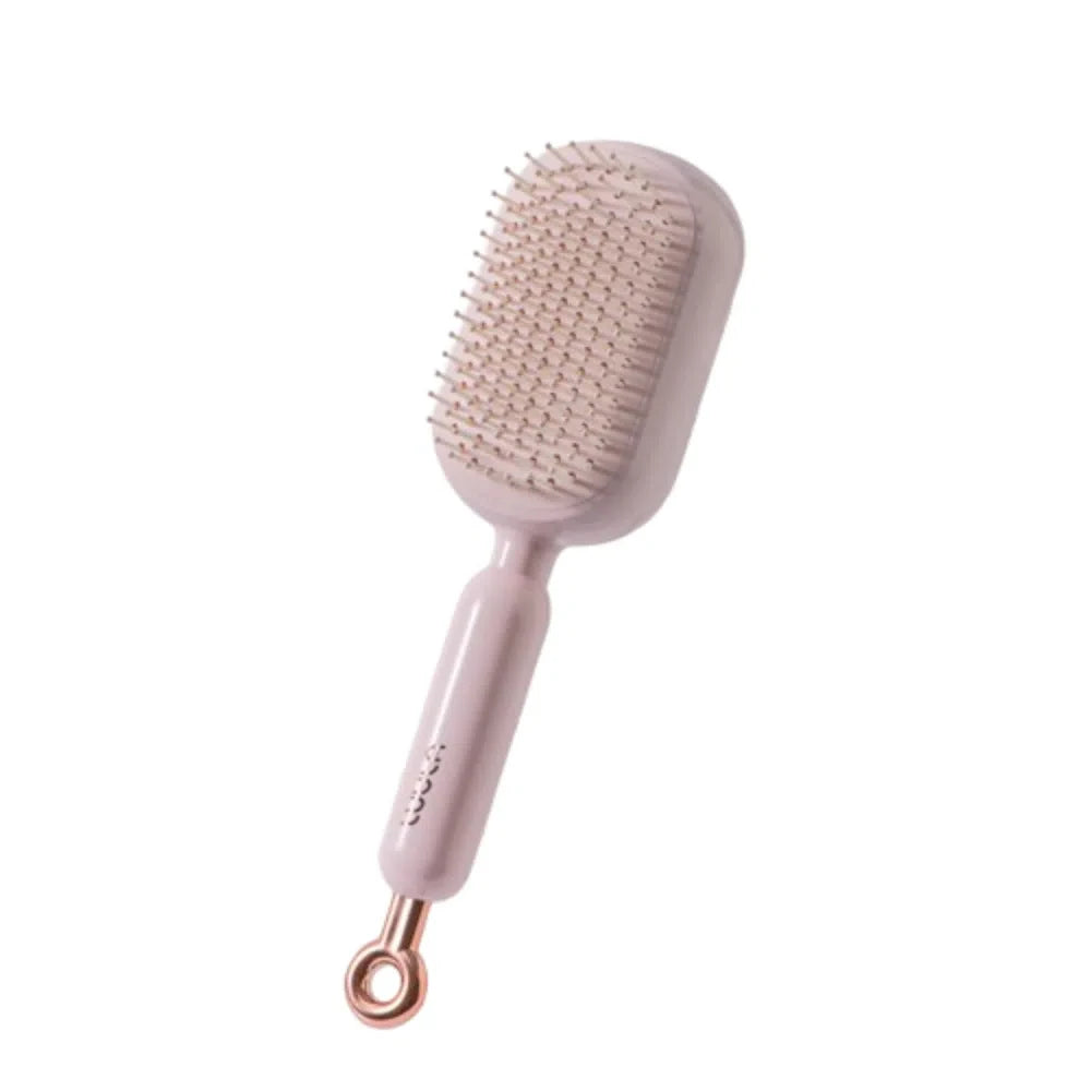 Brosse massage à coussin d’air – Démêlage doux & cuir chevelu stimulé